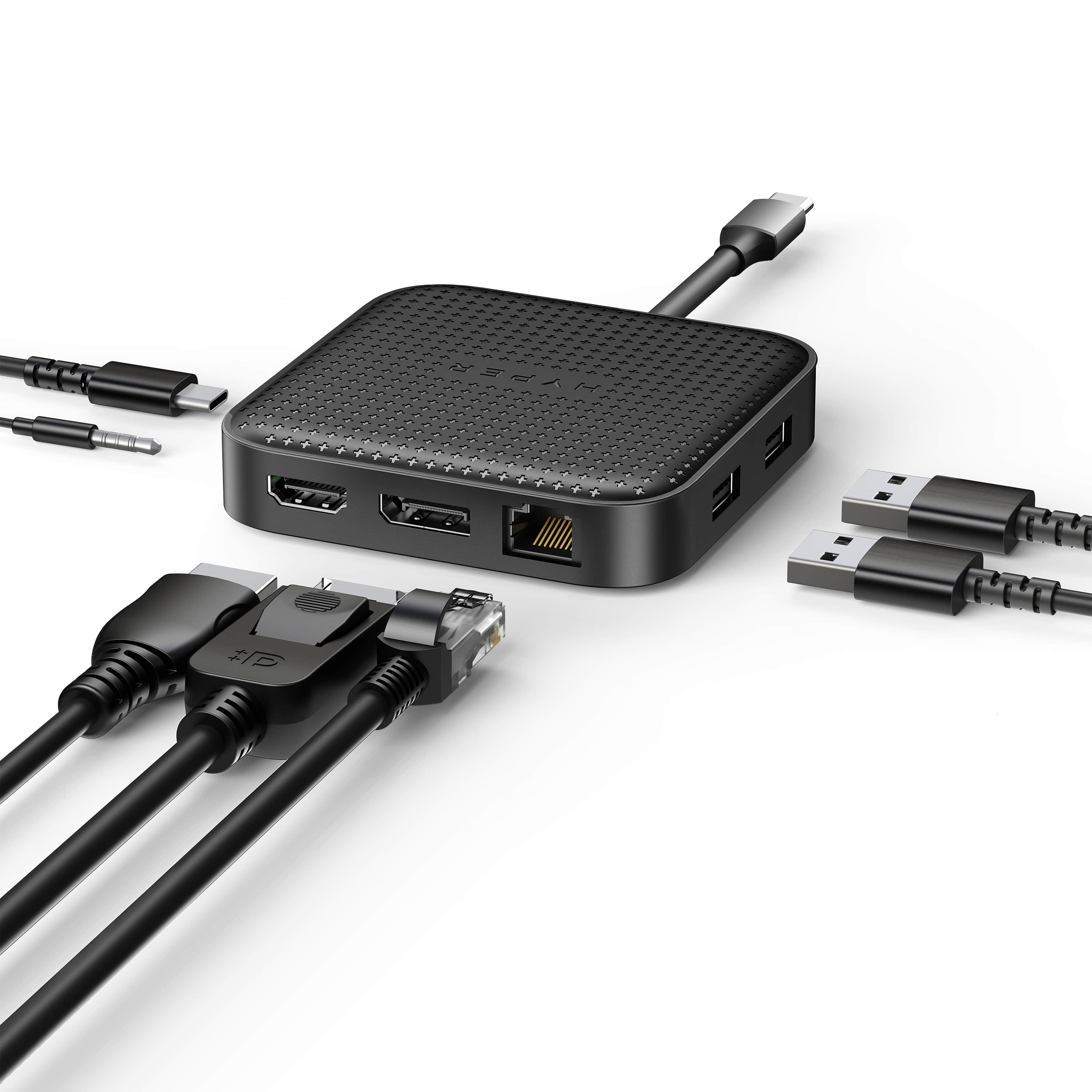 Hub negro con múltiples puertos y cables negros adjuntos con varios conectores.