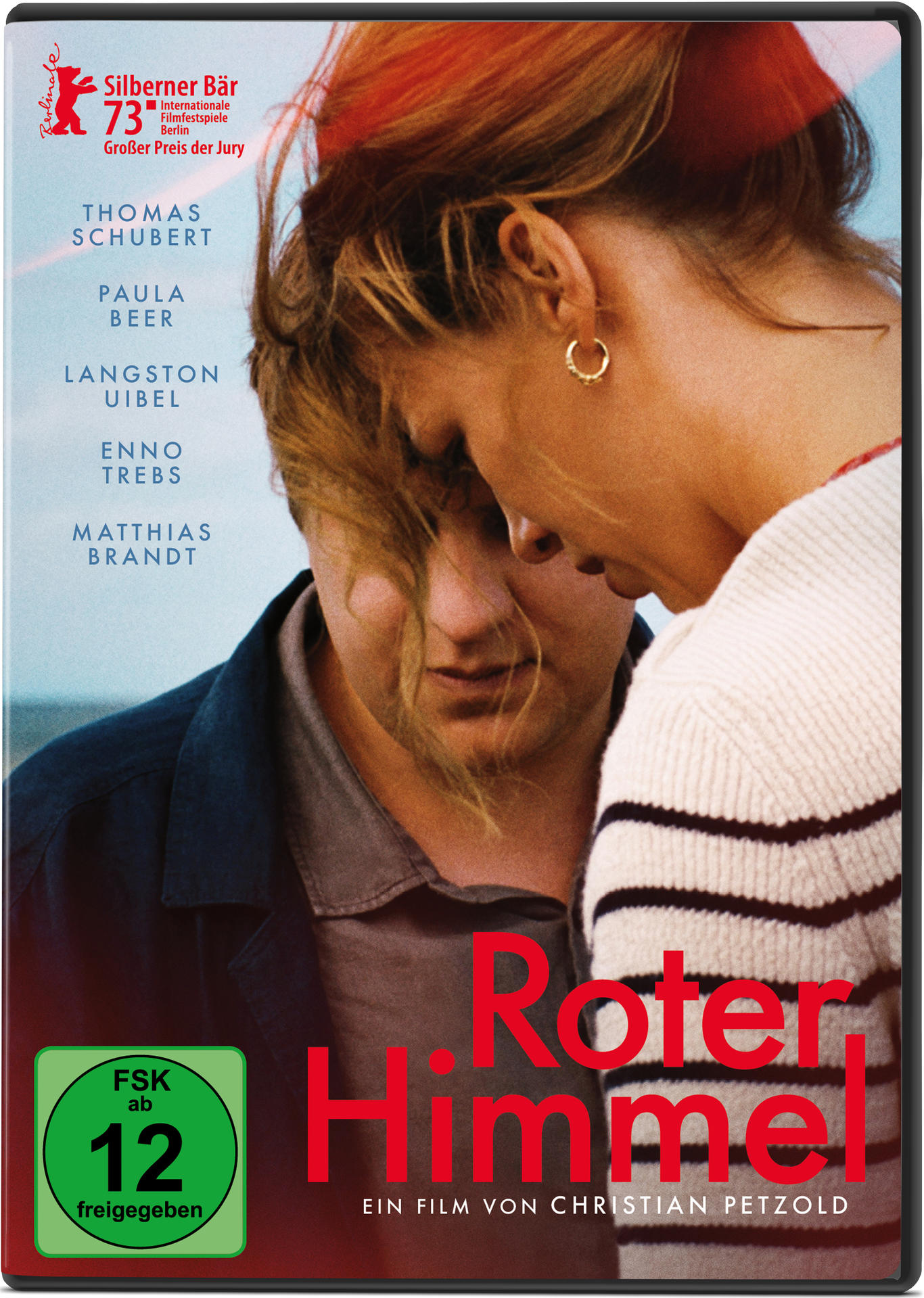 DVD-Cover: Zwei Personen, rotes Haar und Text 'Roter Himmel'. FSK 12 Logo ist sichtbar.