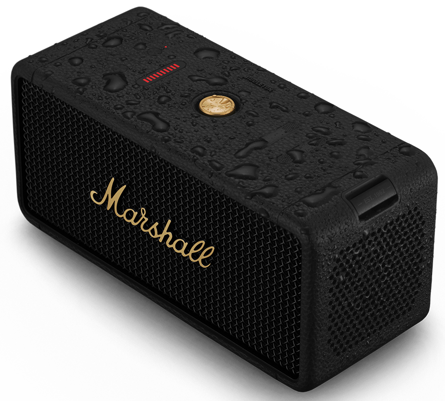 Black Marshall speaker with gold logo and accents, covered in water drops, against a black background.