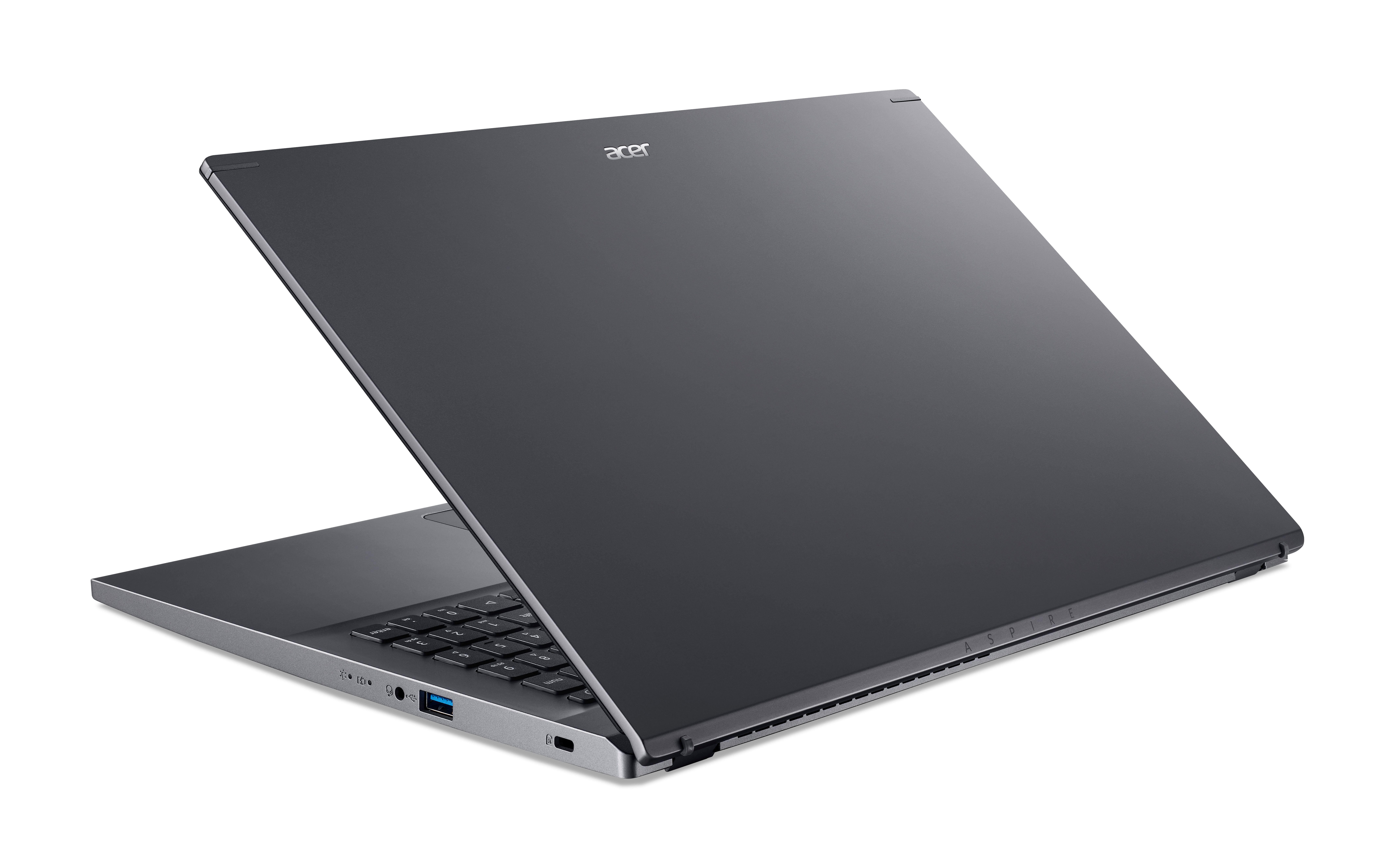 Ein dunkelgrauer Acer-Laptop, der in einem Winkel geöffnet ist, wobei das Acer-Logo sichtbar ist.