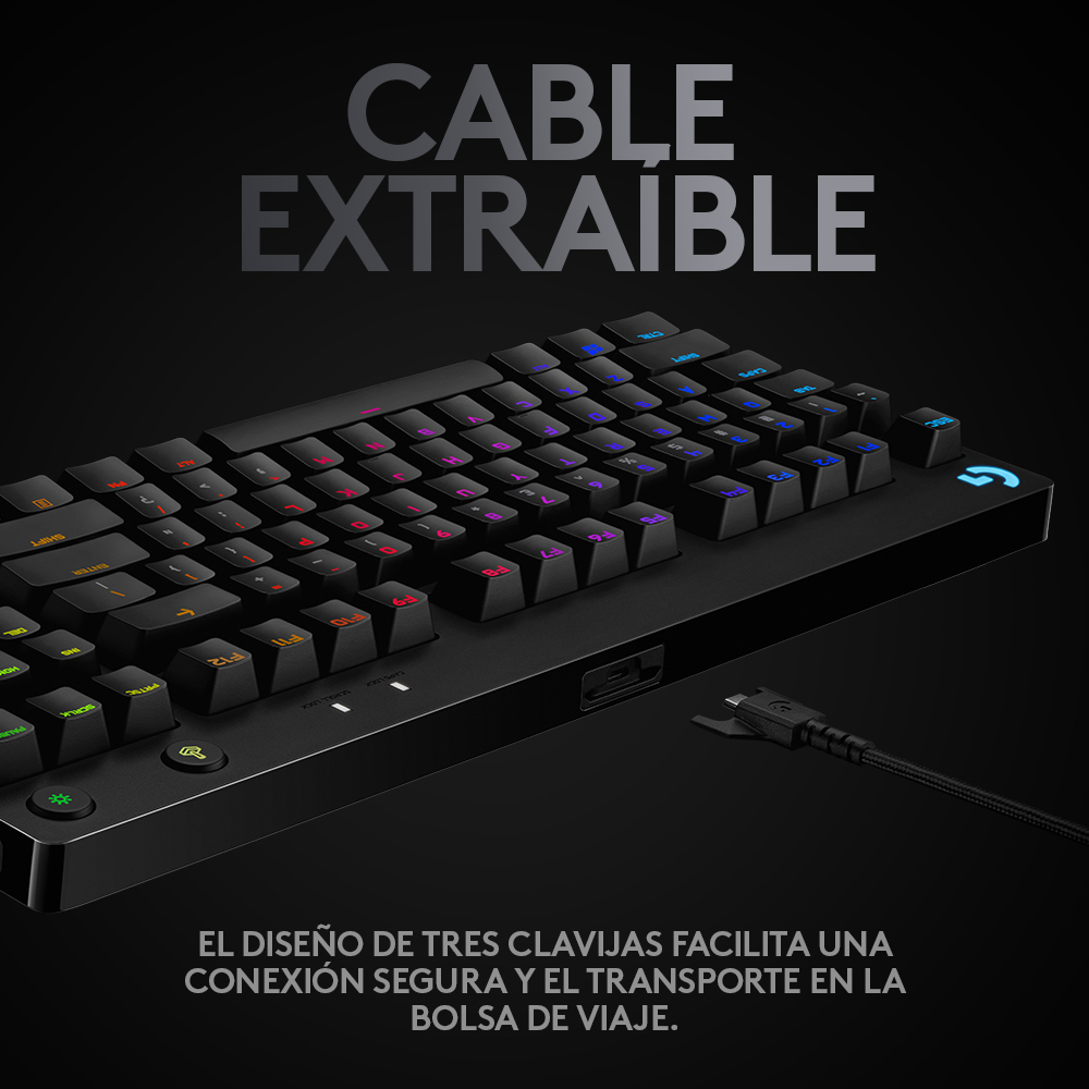 Teclado negro con teclas coloridas y cable desmontable. Texto en español describe conexión segura y viaje.