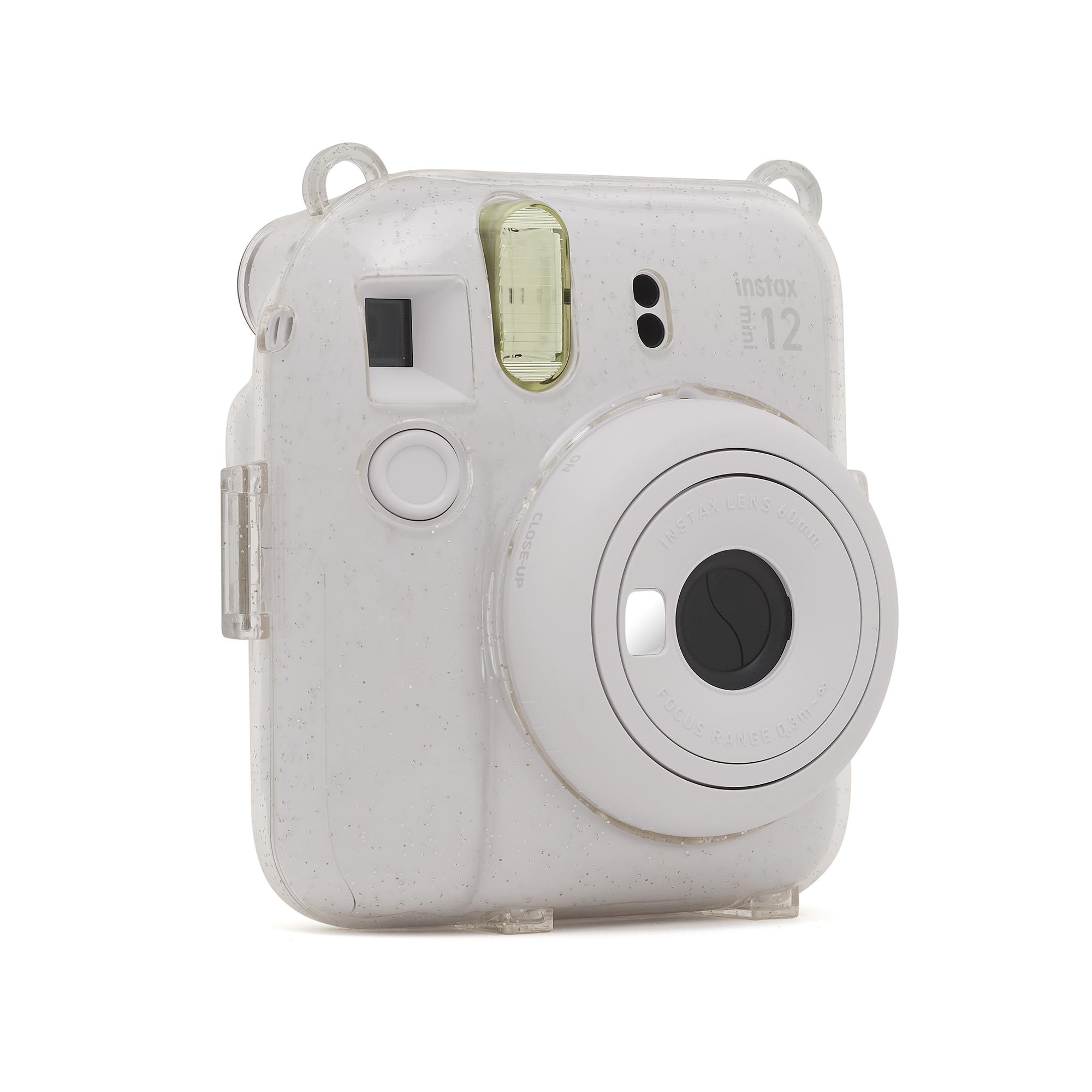 Eine weiße Instax Mini 12 Sofortbildkamera mit transparentem Gehäuse.