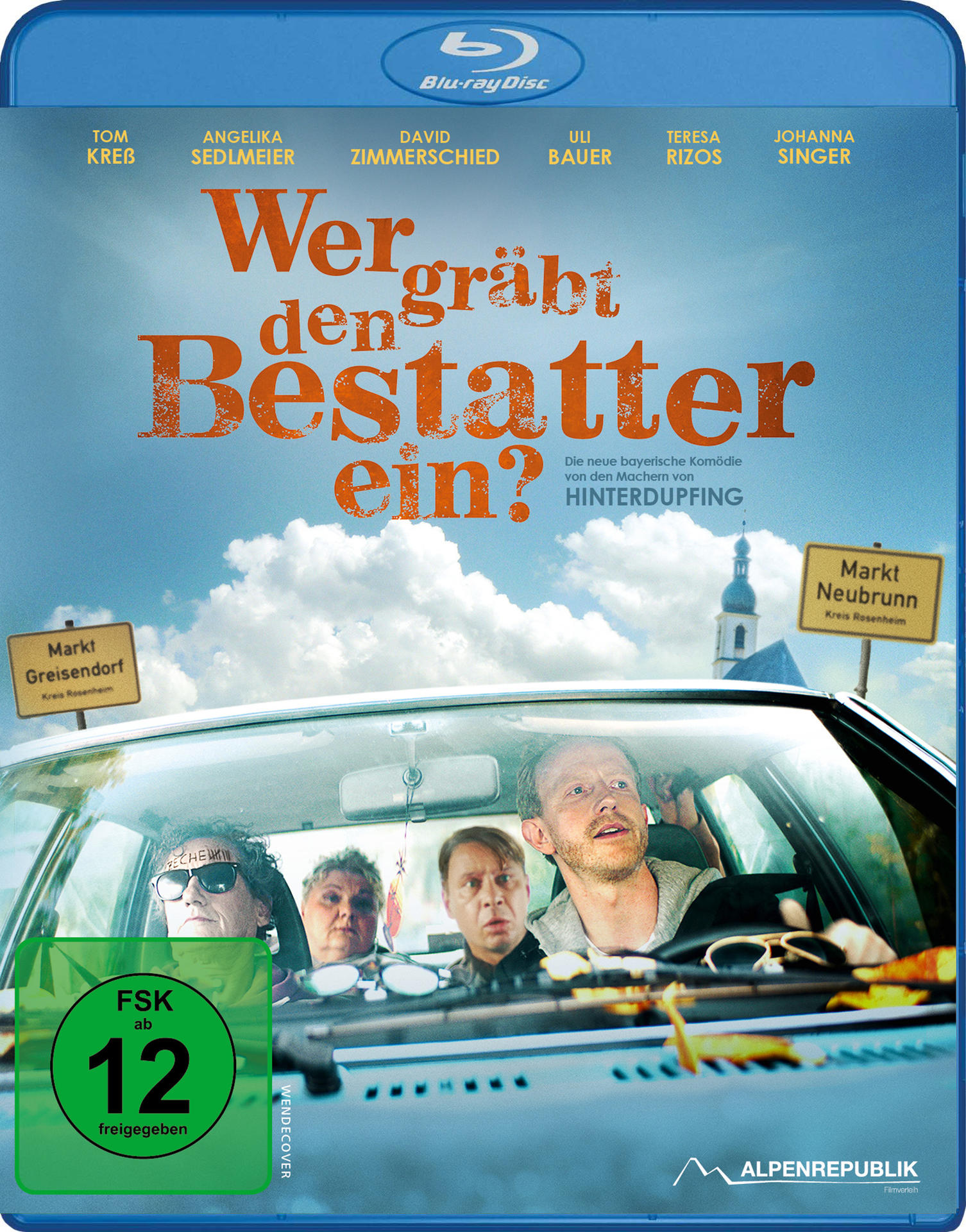 Blu-ray-Cover. Ein Auto mit Leuten darin, mit dem Text 'Wer gräbt den Bestatter ein?'