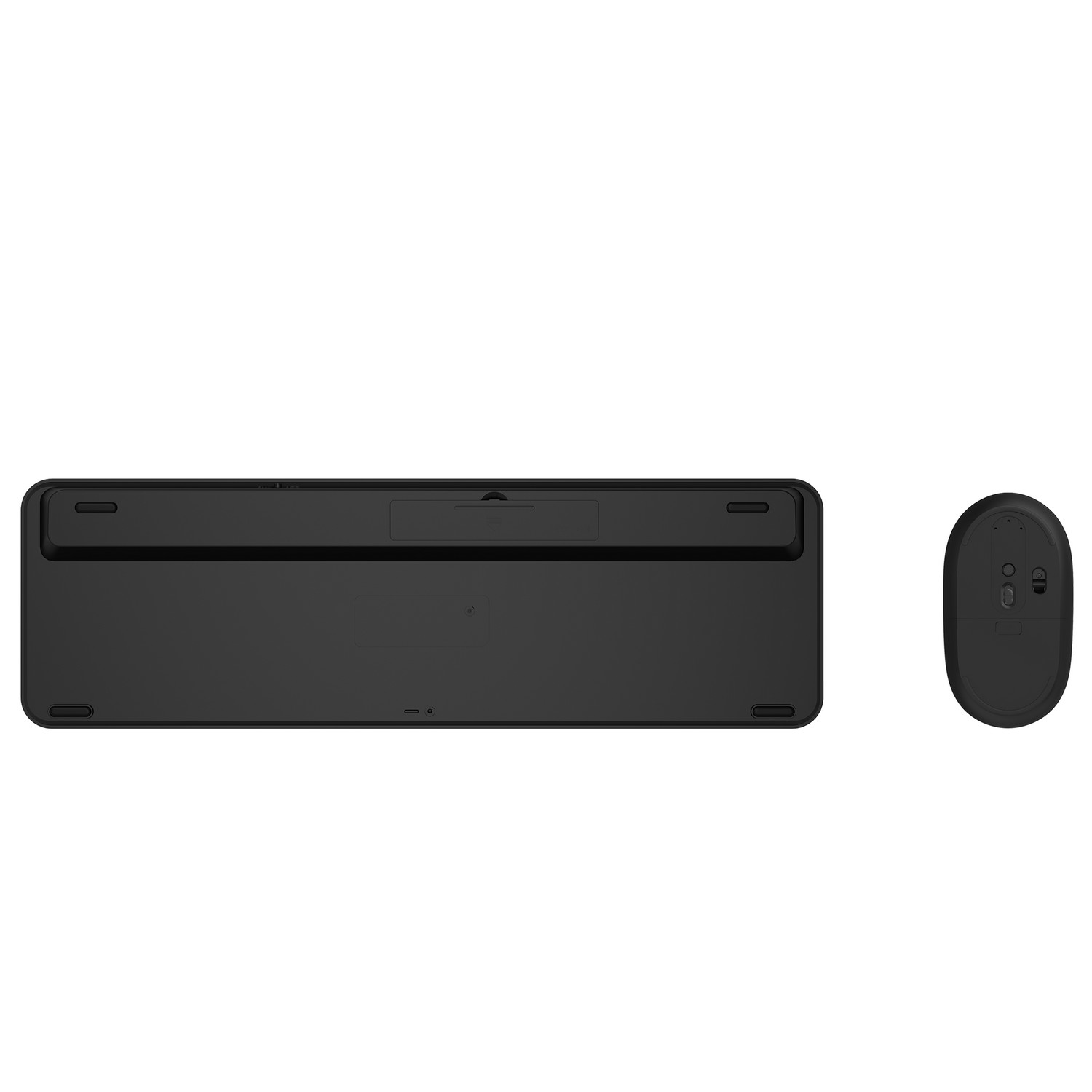 A black keyboard and mouse set on a white background. The mouse is next to the keyboard.