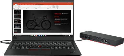 Ein Laptop, der mit einer Dockingstation verbunden ist. Der Laptop zeigt eine Präsentation über ein Fahrrad.