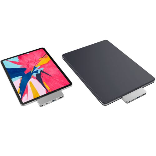 Dos iPads con concentradores plateados. Uno muestra una imagen colorida, el otro una tapa negra.
