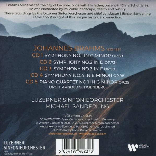 Albumcover mit Text und einer Berglandschaft.