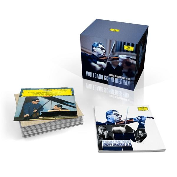 Box-Set mit einem Geiger, Albumcovern und einem Würfel, der den Geiger zeigt. Weißer Hintergrund.