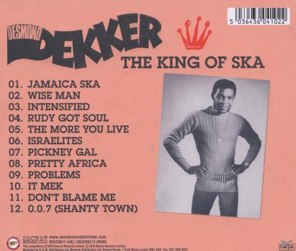 Album borító: Desmond Dekker, öltönyben, fekete háttérrel, számlistával és korona logóval.