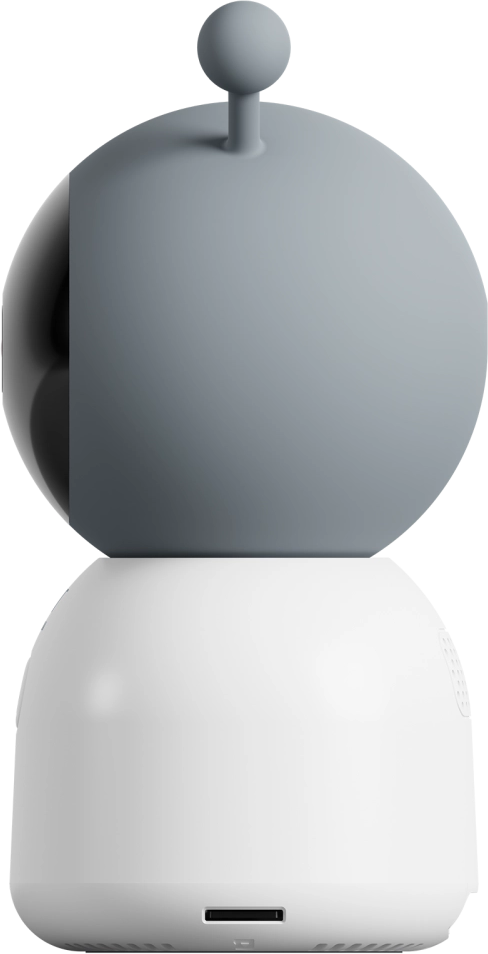 Egy fehér és szürke robot-szerű készülék lekerekített tetővel és USB porttal az alján.