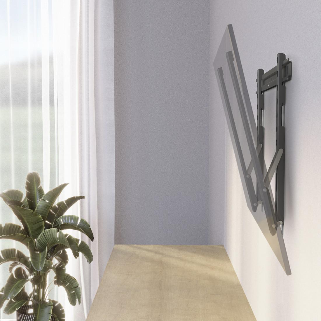 Ein Fernseher ist an einer Wand montiert. Der Fernseher ist abgewinkelt. Die Wand ist grau.