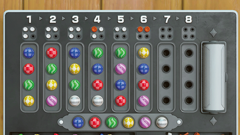 Close-up van een spelbord. Het heeft gekleurde knikkers en genummerde indicatoren. Het bord is grijs, met een houten achtergrond.