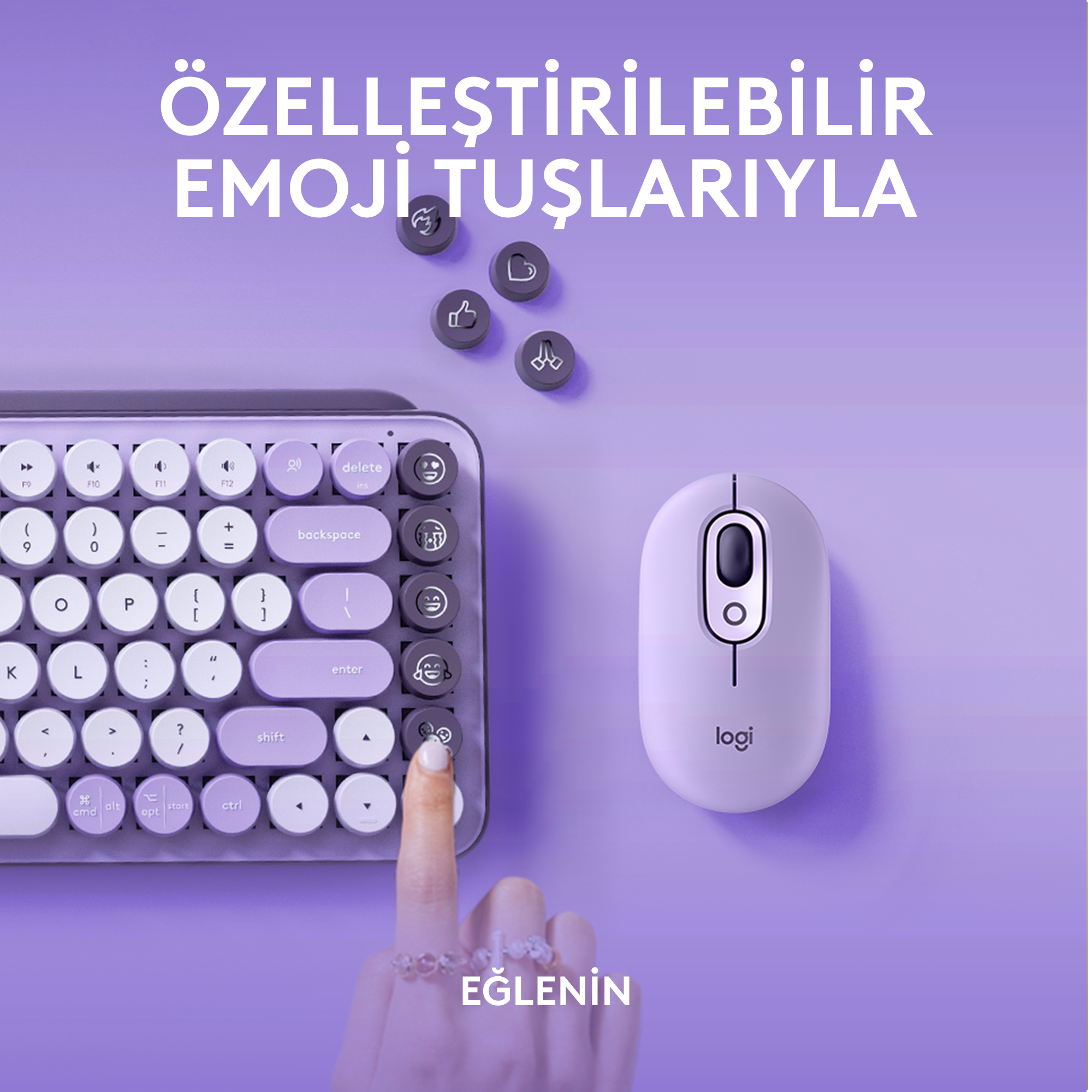 Mor bir yüzey üzerinde klavye, fare ve emoji simgeleri. Türkçe metin: 'EĞLENİN'.
