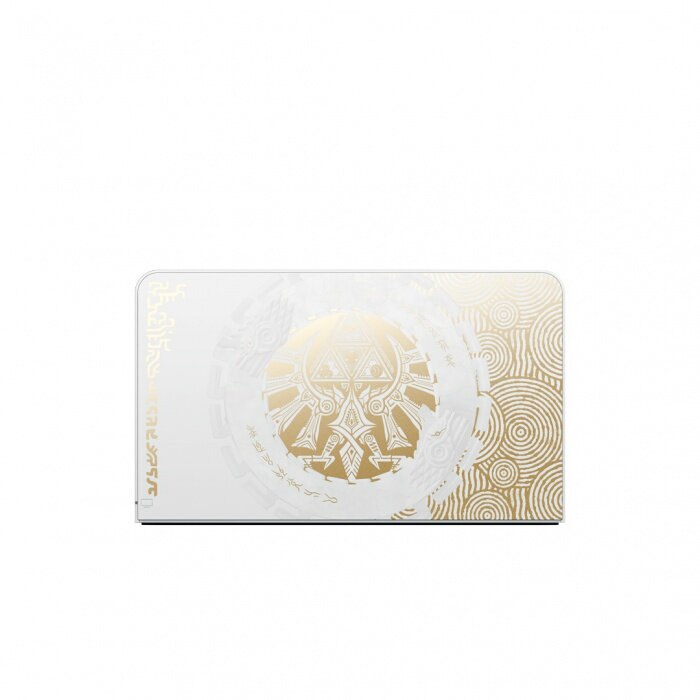 Biały laptop ze złotym wzorem z emblematem Zelda. Laptop jest zamknięty.