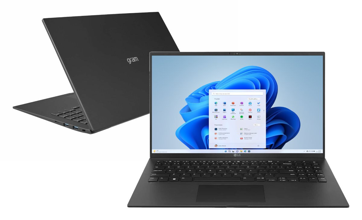 Czarny laptop, otwarty z interfejsem Windows 11 i zamknięty po lewej stronie.