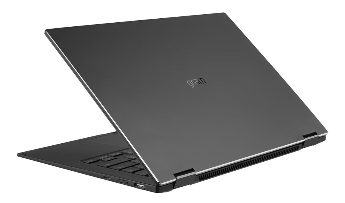 Tył ciemnoszarego laptopa z logo 'gram'.