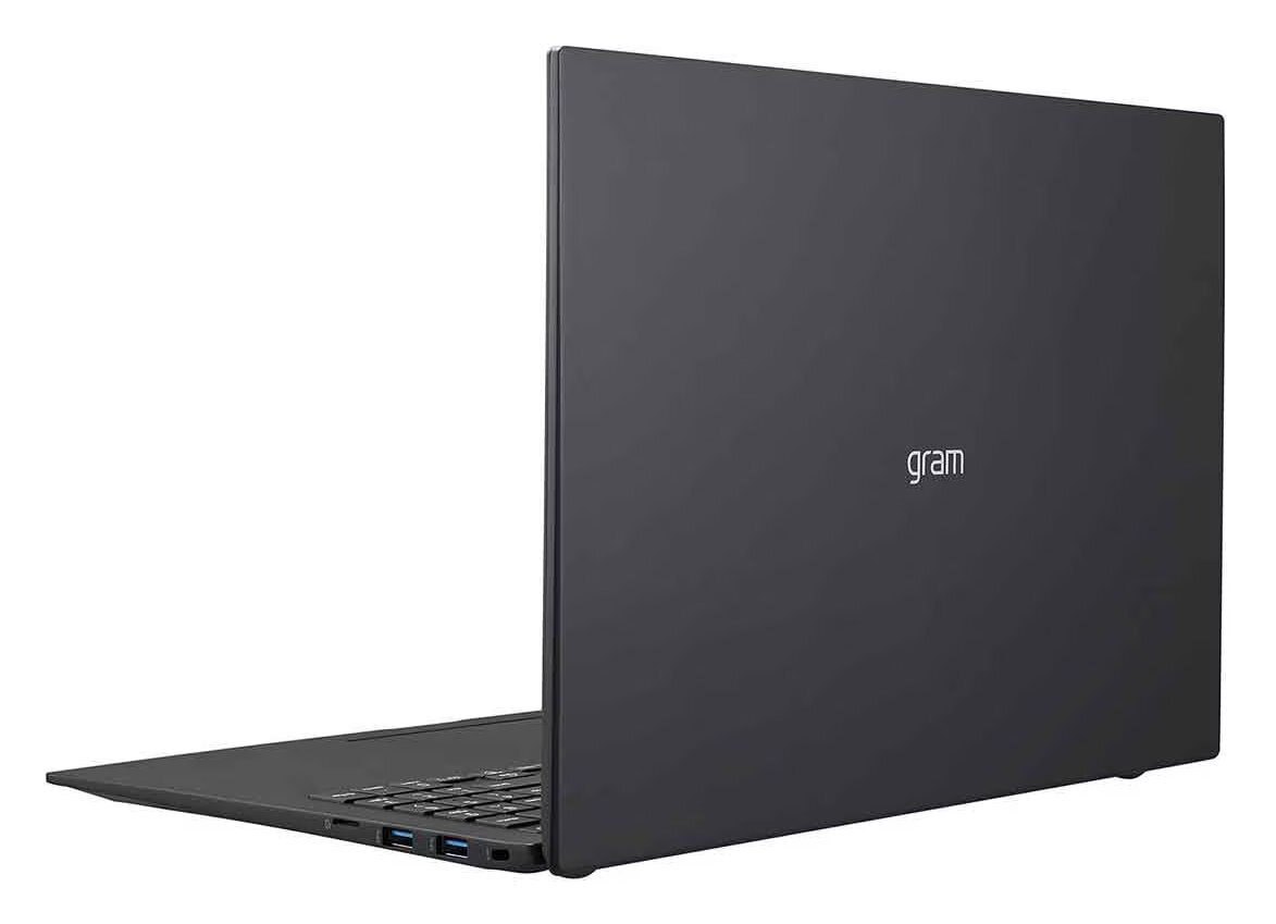 Ciemnoszary laptop, widoczny tył. Słowo 'gram' jest wydrukowane w prawym górnym rogu.