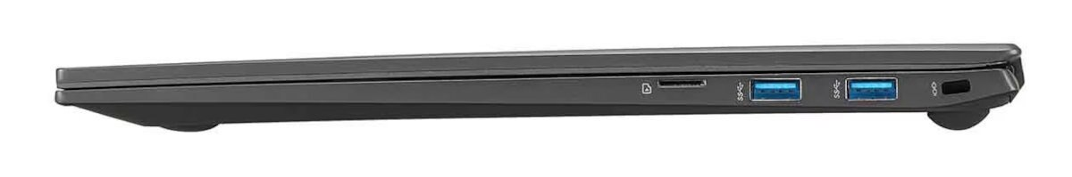 Widok z boku zamkniętego laptopa, pokazujący porty i krawędzie.