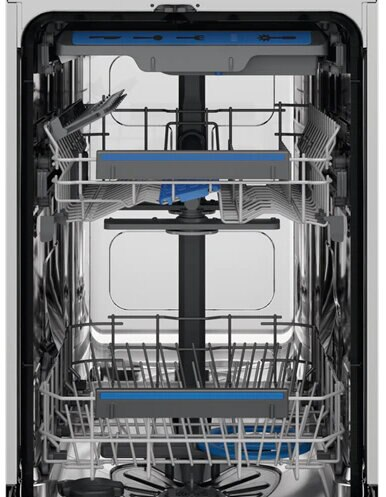 Wnętrze zmywarki pokazujące półki i ramiona natryskowe, z wyraźnym widokiem na jej strukturę.