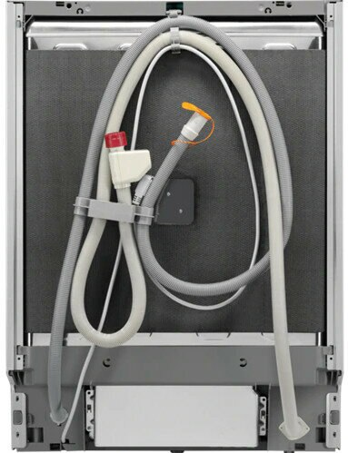 Tył zmywarki pokazujący węże, złącza i inne elementy wewnętrzne.