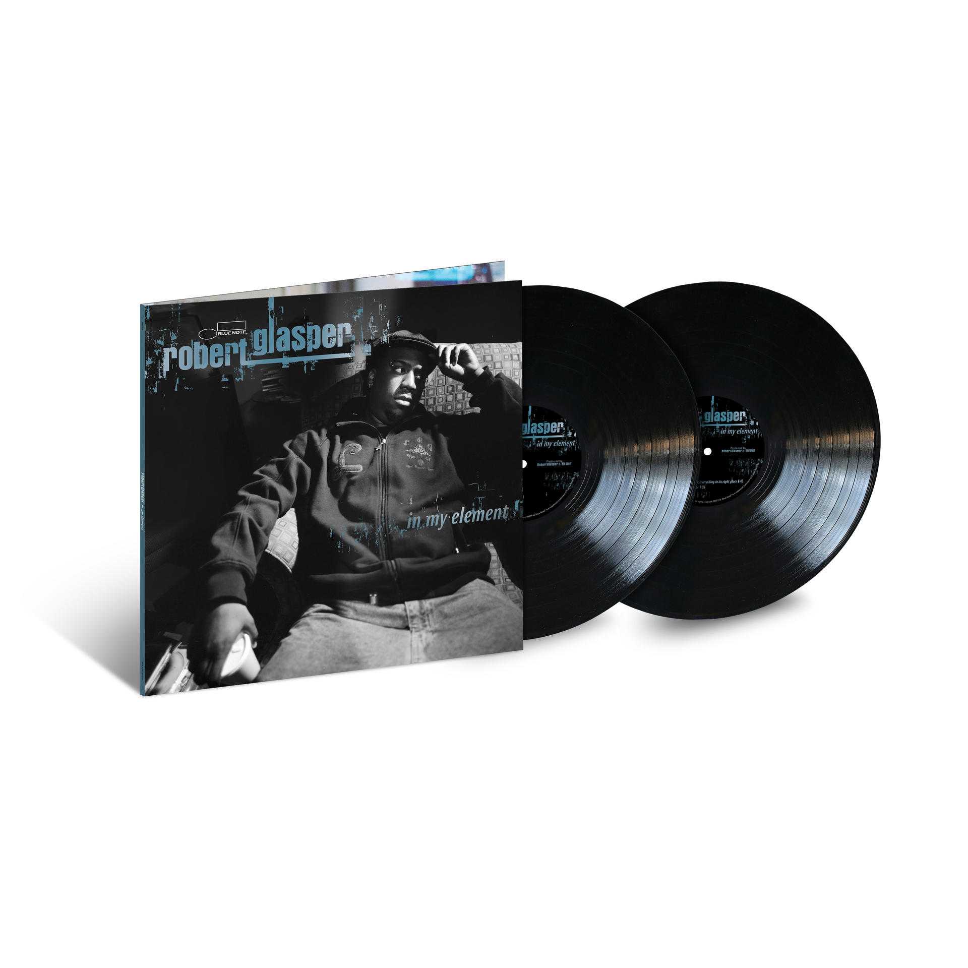 Albumcover: Robert Glasper mit zwei schwarzen Vinylplatten. Das Album heißt 'In My Element'.