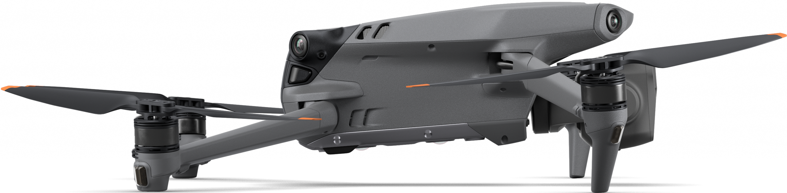Un drone grigio con quattro eliche.