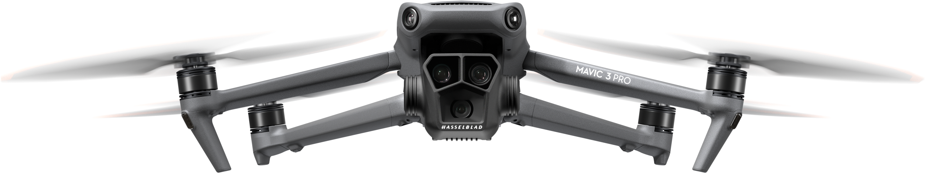 Drone con tre fotocamere, carrello di atterraggio ed eliche. Corpo grigio, sfondo bianco.
