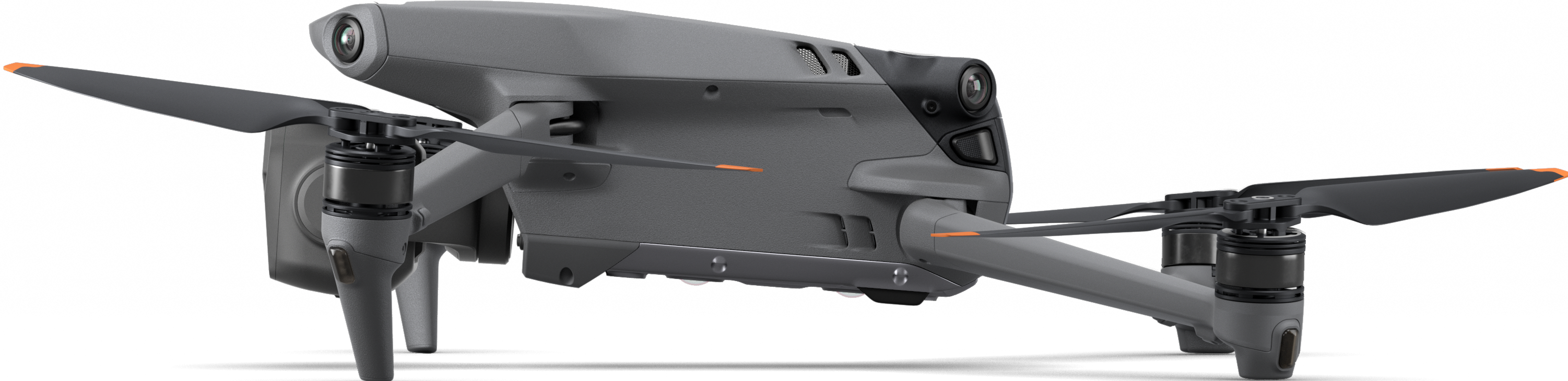 Un drone grigio con eliche nere e punte arancioni. Il drone ha più telecamere ed è su sfondo bianco.