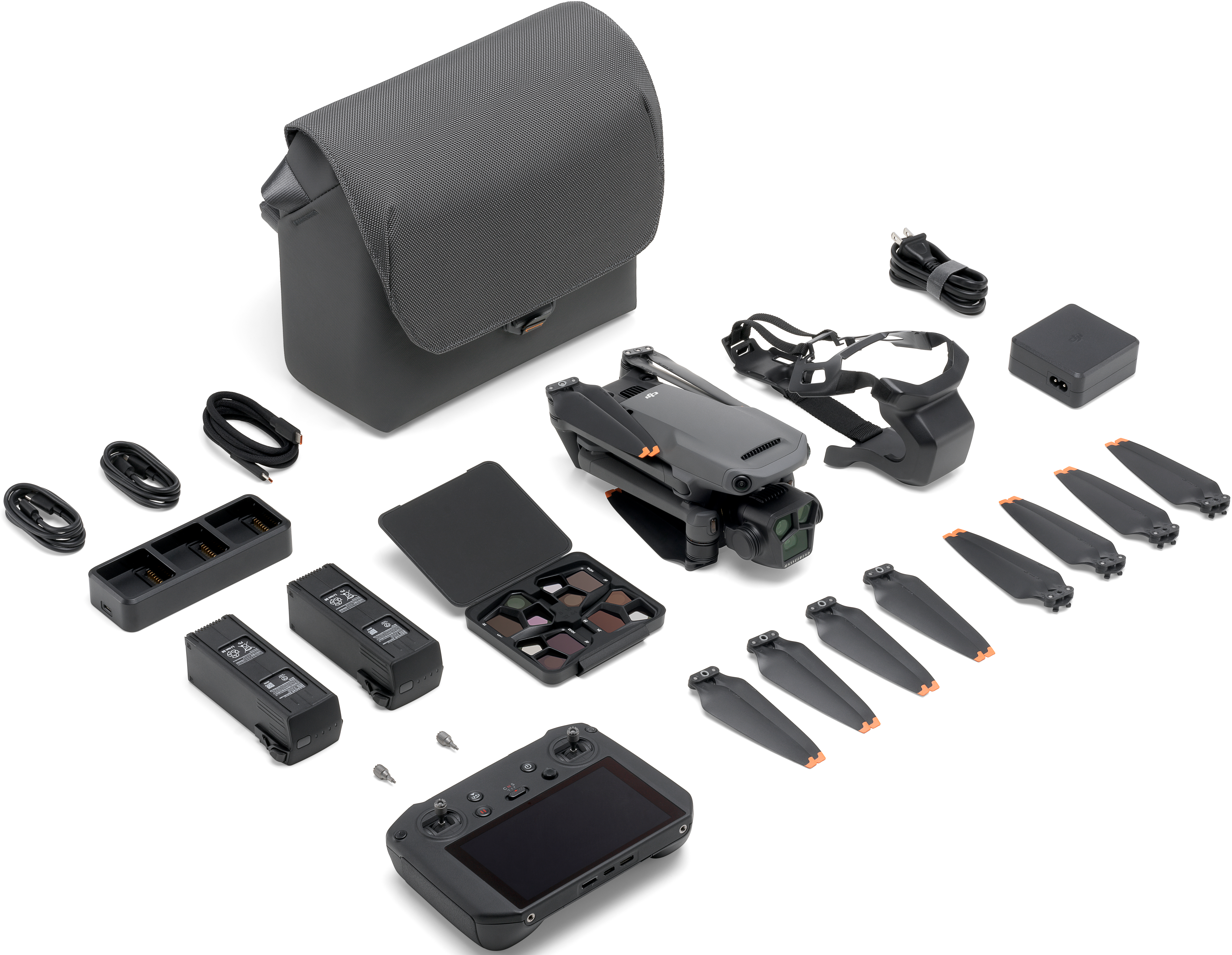 Kit drone con drone, telecomando, custodia, batterie, caricabatterie, filtri e altri accessori.