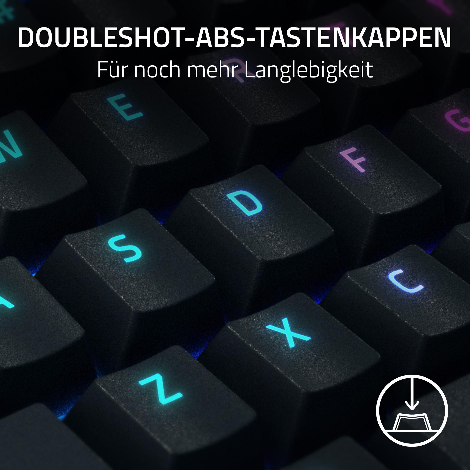 Nahaufnahme von schwarzen Tastaturtasten. Buchstaben S, D, F, X, Z usw. sichtbar. Beleuchtete Tasten.