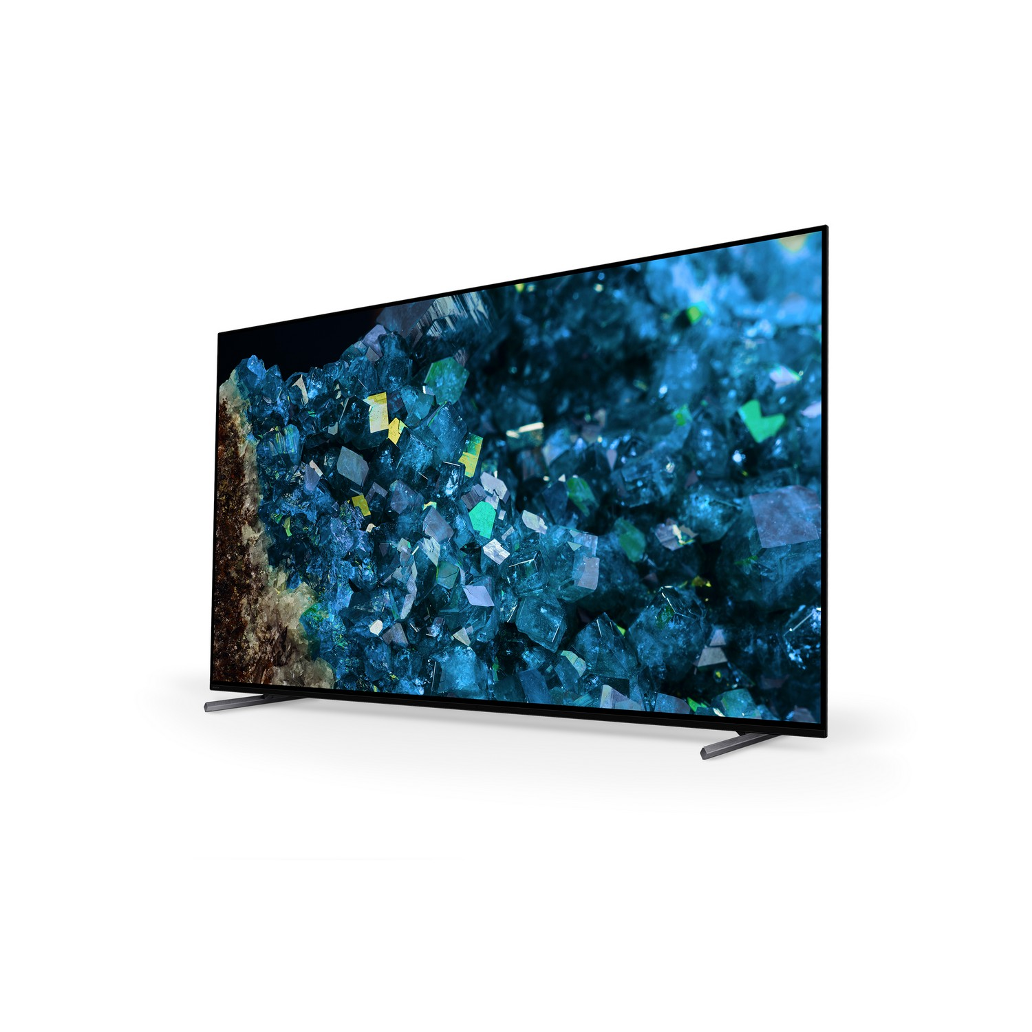 Un écran de télévision avec une image abstraite de cristaux bleus et verts.