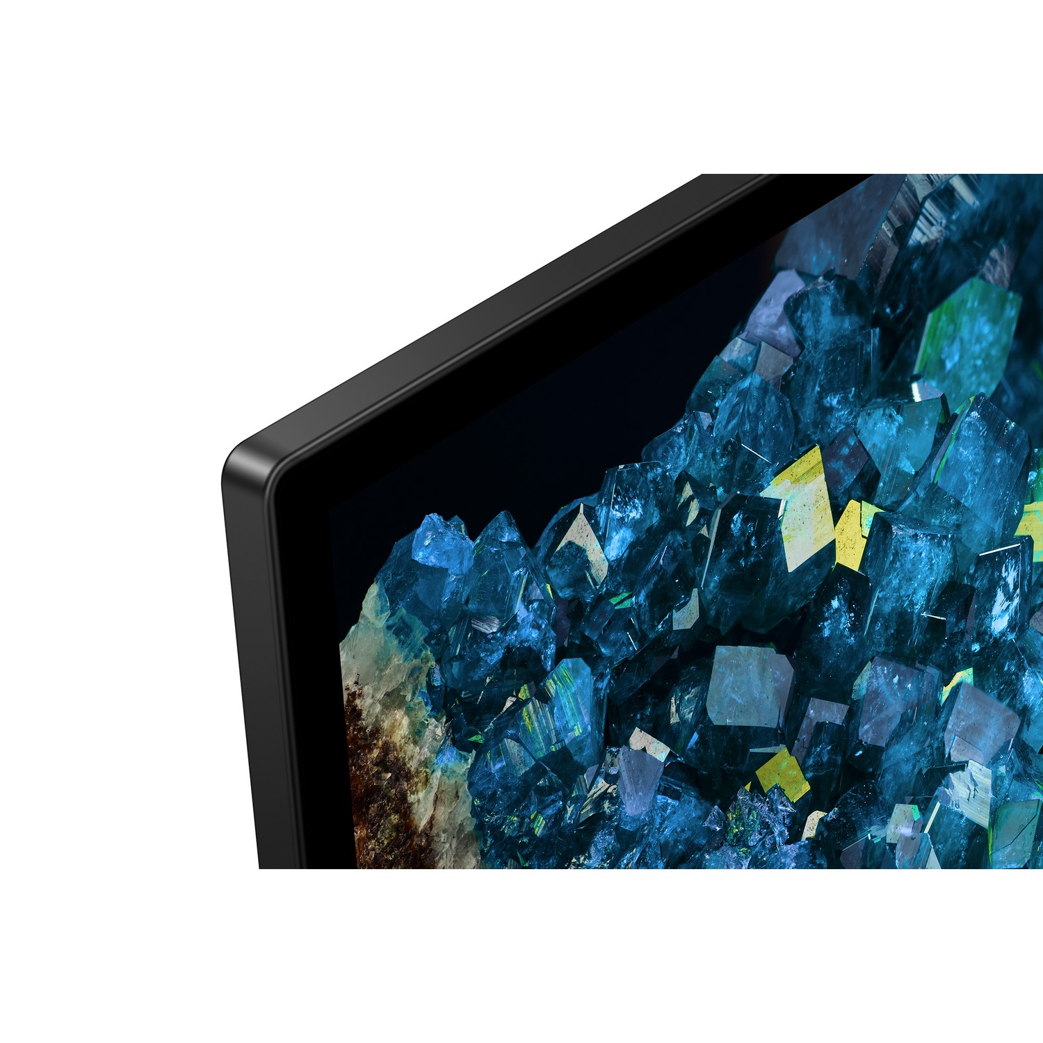 Gros plan d'un coin de téléviseur avec cadre noir et affichage cristallin bleu-vert.