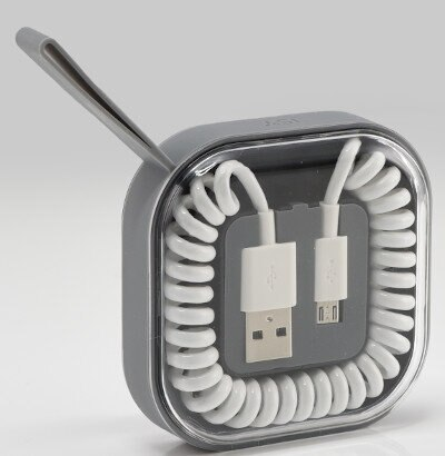 Szary organizer kabli z białym kablem w środku.