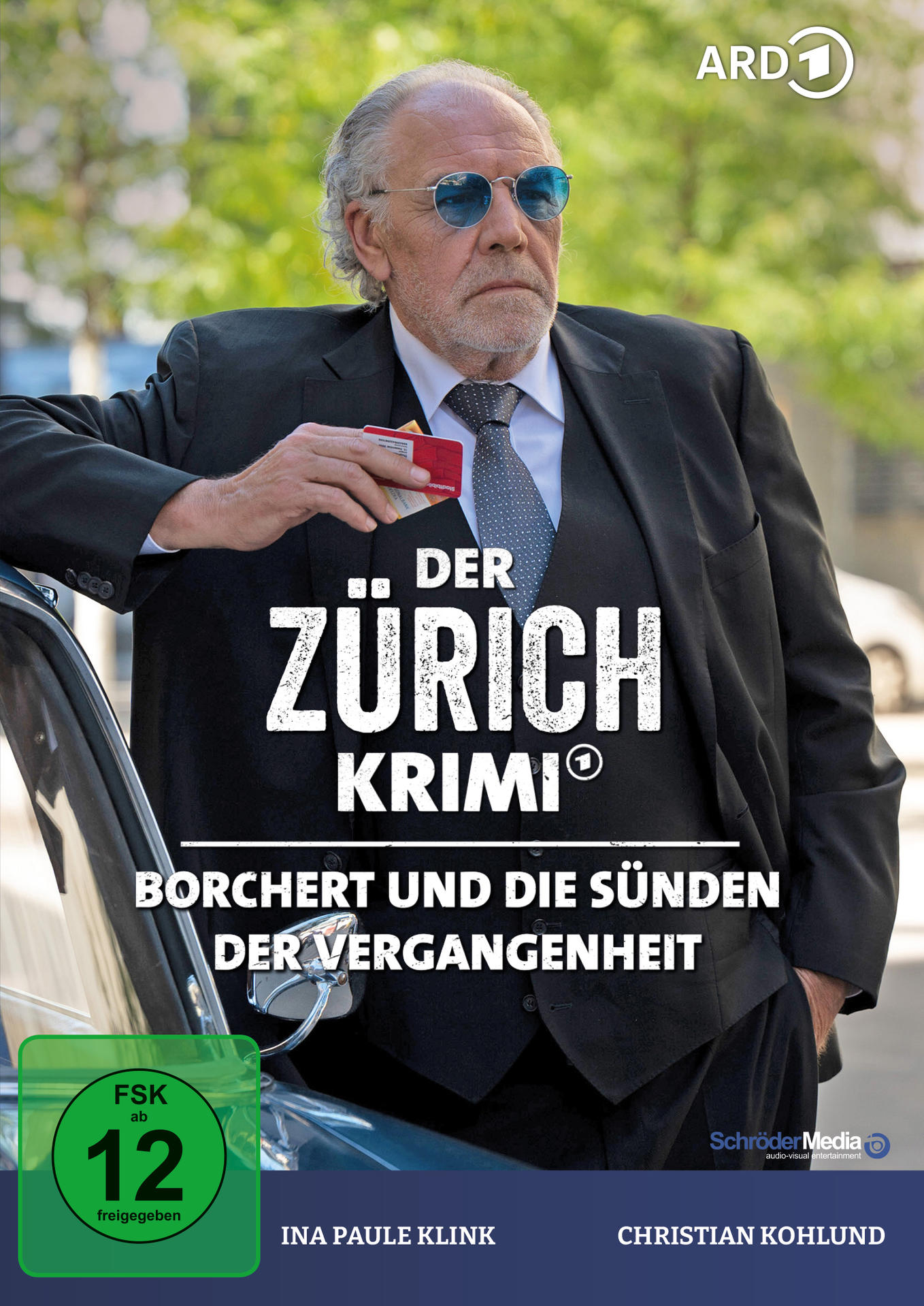 Ein Filmplakat für 'Der Zürich Krimi', mit einem Mann im Anzug und Sonnenbrille.