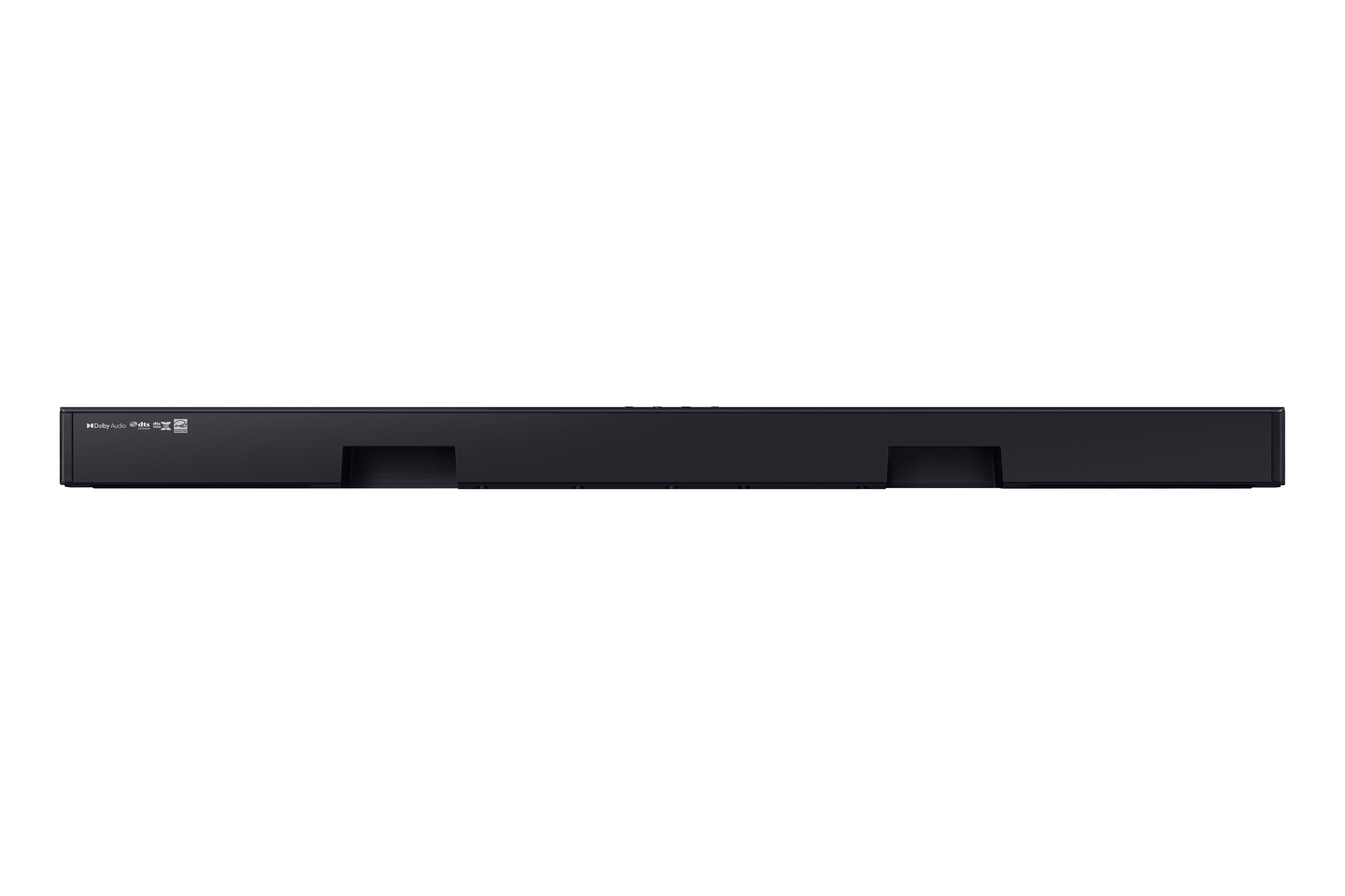 Eine schwarze Soundbar mit mehreren Öffnungen. Die Soundbar ist vor einem schwarzen Hintergrund platziert.