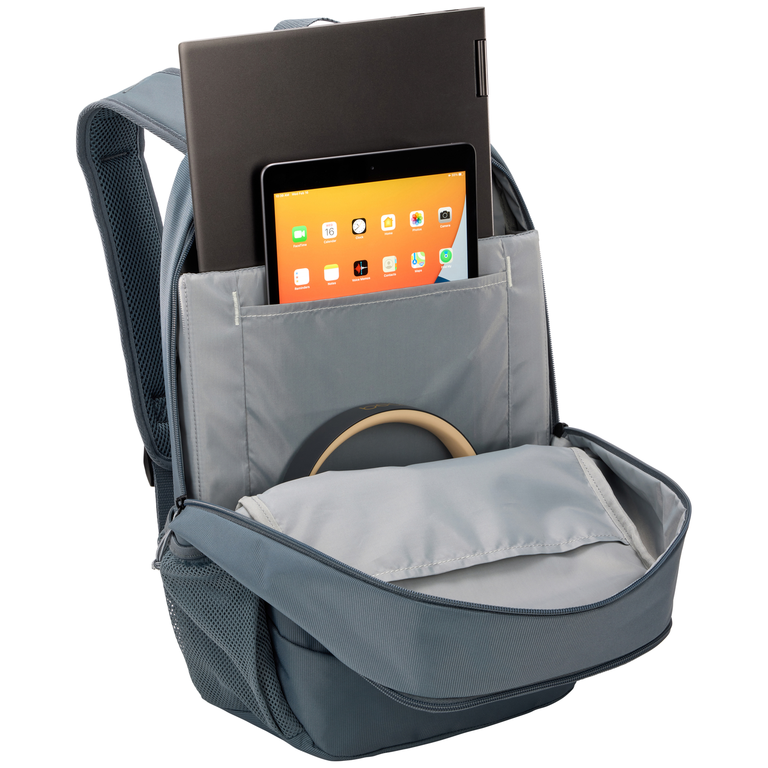 Backpack with a laptop and tablet inside, open for view.