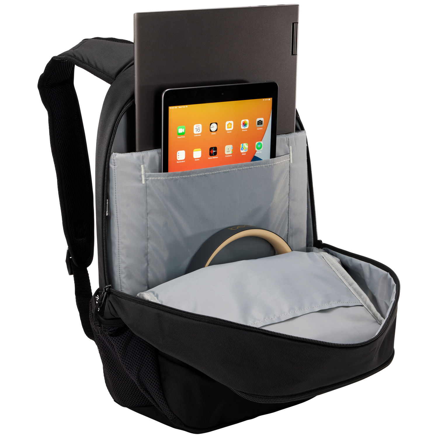 Black backpack, open, holds a laptop, tablet, and headphones.