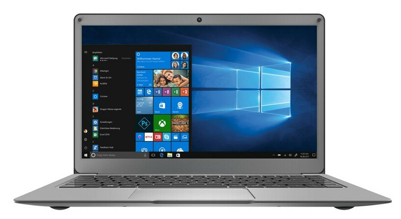 Laptop z szarą obudową, pokazujący ekran startowy Windows. Ekran wyświetla różne aplikacje.