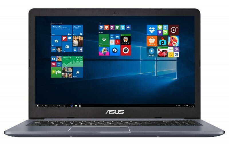 Otwarty laptop z interfejsem Windows. Ekran wyświetla ikony aplikacji i niebieskie tło.