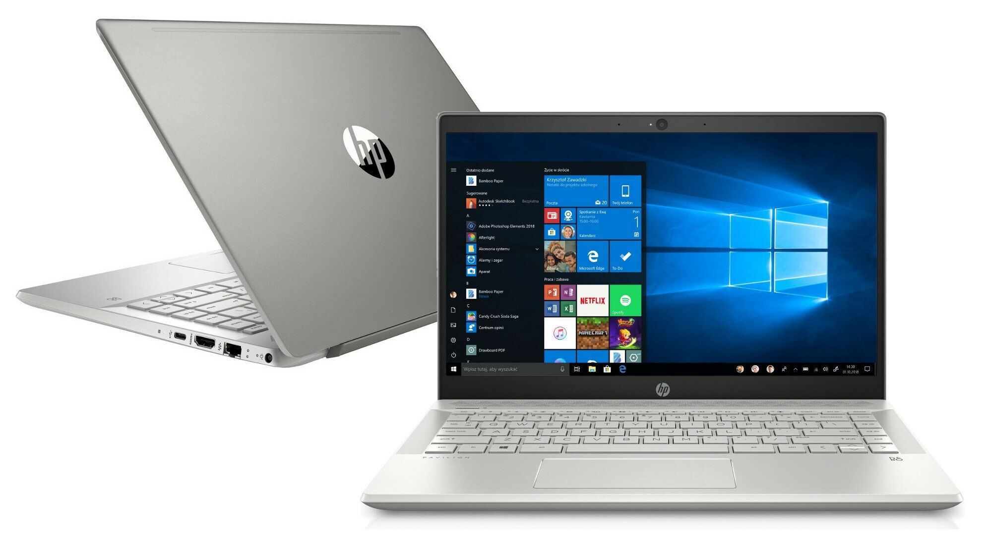 Dwa laptopy obok siebie, jeden otwarty, drugi zamknięty.