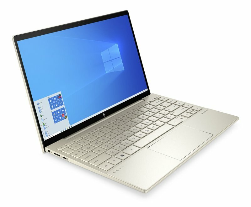 Złoty laptop z niebieskim ekranem Windows, otwarty na białej powierzchni.