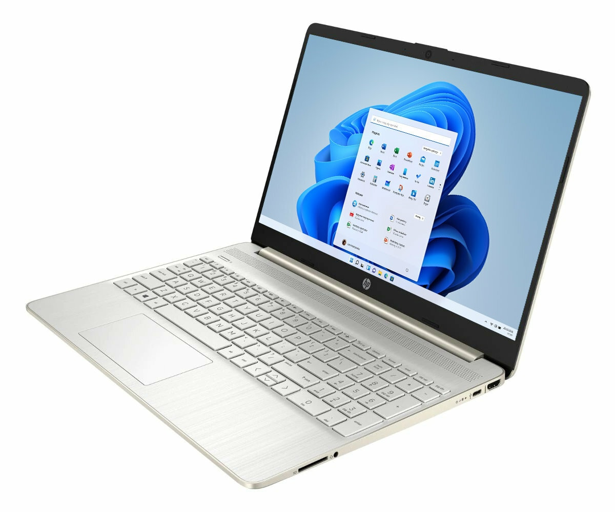 Srebrny laptop otwarty, wyświetlający ekran z interfejsem Windows 11. Białe tło.