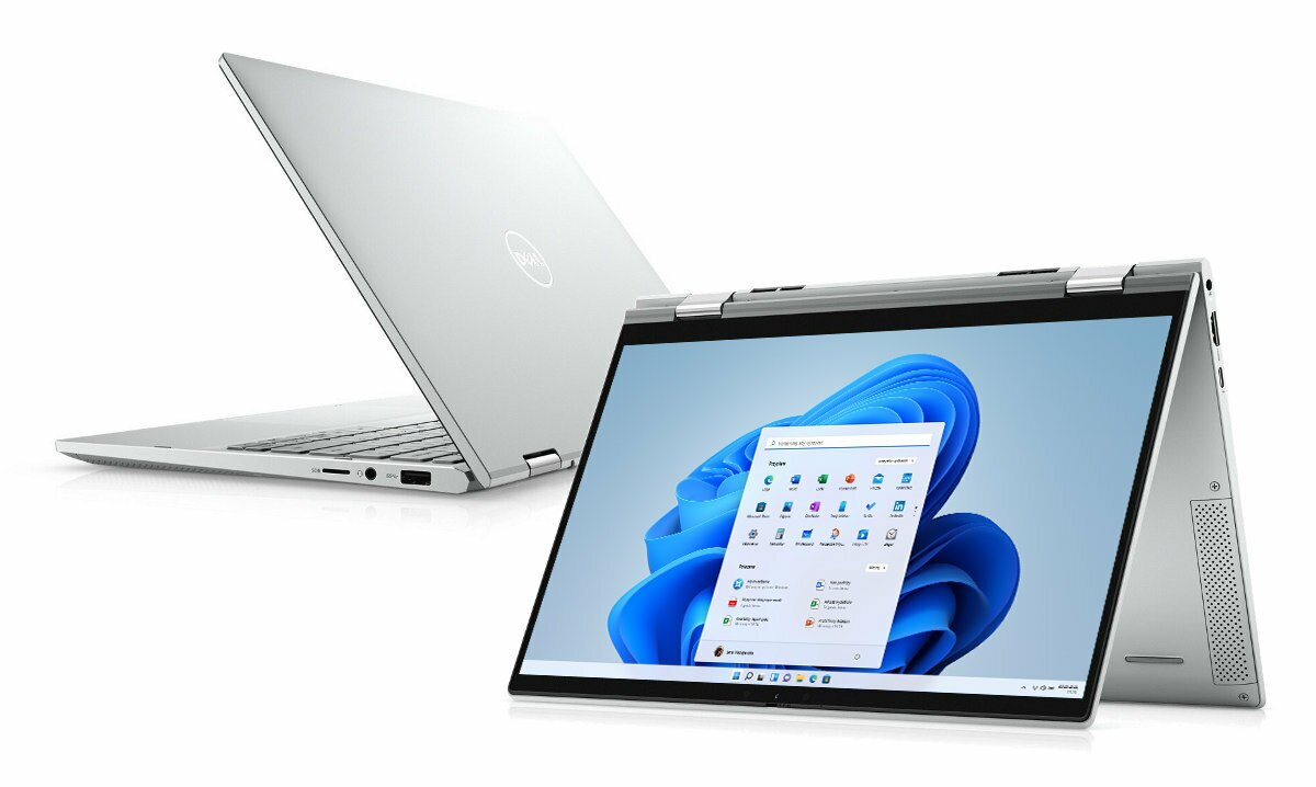 Dwa srebrne laptopy, jeden otwarty i pod kątem, drugi zamknięty. Wyświetlacz pokazuje Windows 11.