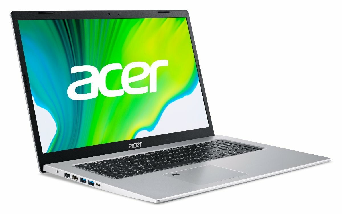 Srebrny laptop z logo Acer na ekranie, widok z kąta, widoczna klawiatura.