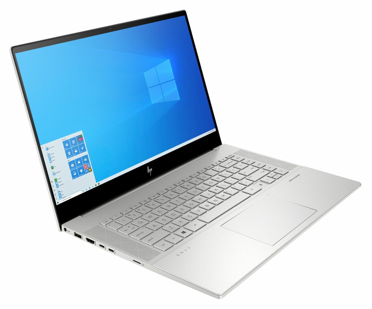 Srebrny laptop HP otwarty, z niebieskim pulpitem Windows na ekranie. Klawiatura i gładzik widoczne.