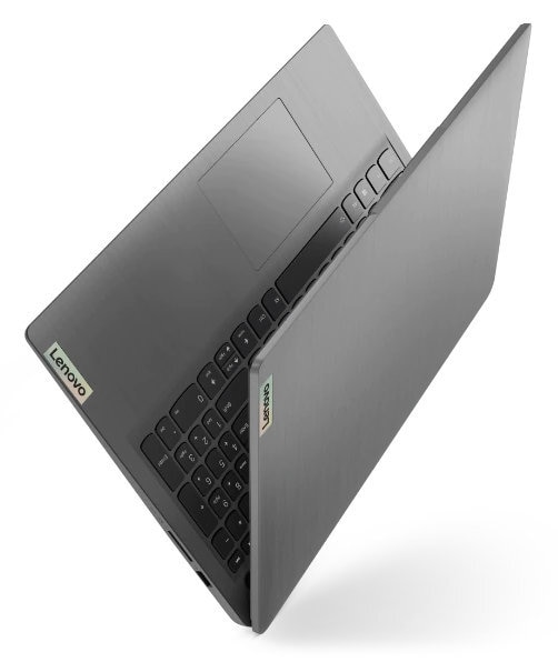 Szary laptop jest otwarty, skierowany w górę.