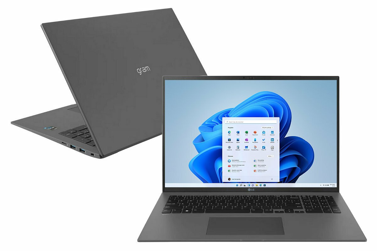 Dwa laptopy, jeden zamknięty, drugi otwarty z interfejsem Windows 11. Szary kolor.