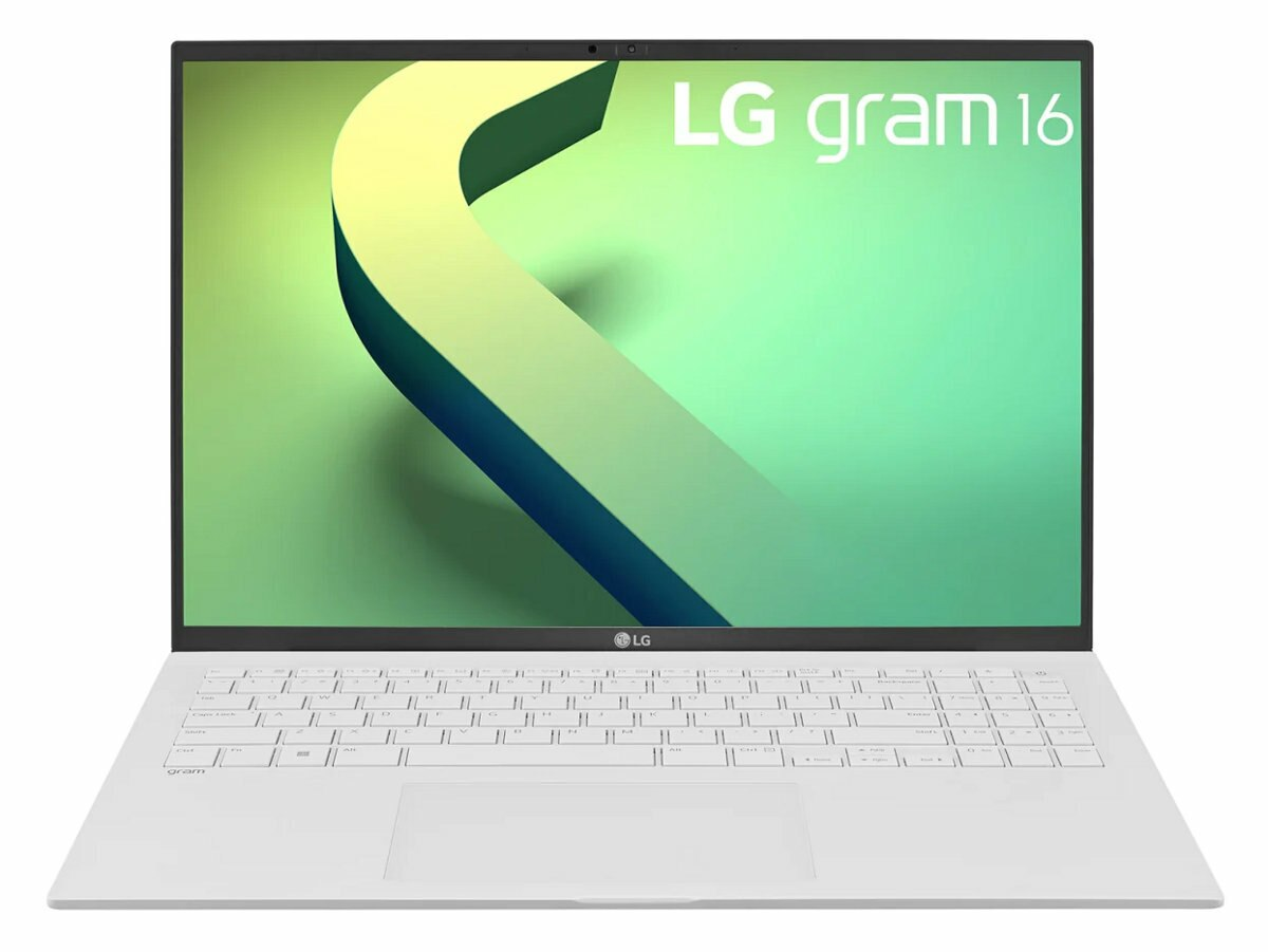 Biały laptop LG otwarty, ekran wyświetla design. Biała klawiatura.