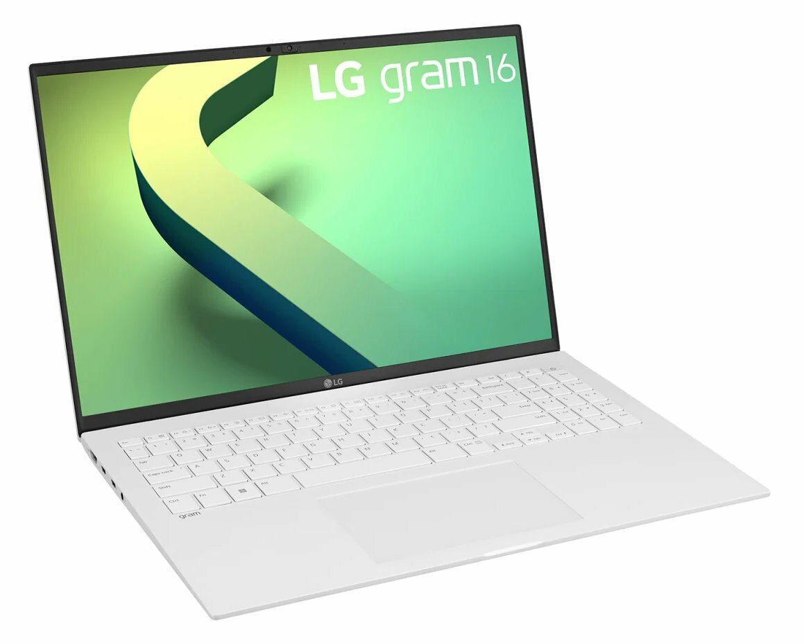 Srebrny laptop z czarną klawiaturą i zielonym ekranem.