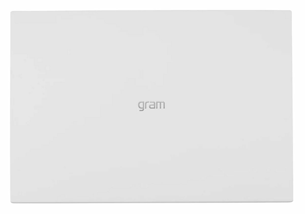 Zamknięty biały laptop z napisem "gram".
